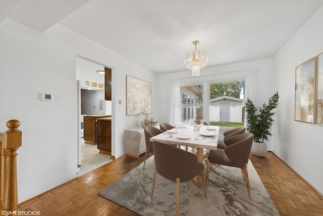 9061 Primrose Ln, Hickory Hills, IL 60457 - dining space featuring a chandelier and baseboards