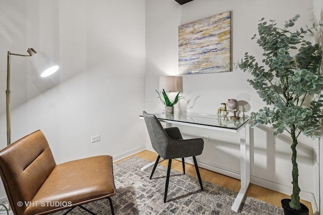 700 N Larrabee St Unit 1409, Chicago, IL 60654 - office with wood finished floors and a baseboard heating unit