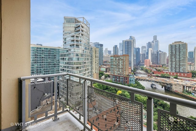 700 N Larrabee St Unit 1409, Chicago, IL 60654 - balcony with a view of skyline and a water view
