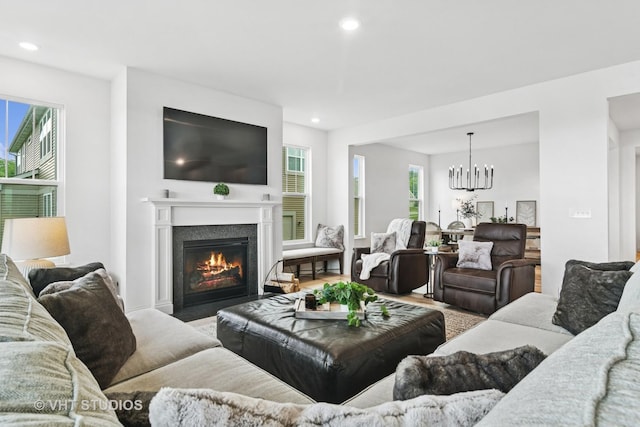1140 River Birch Blvd, Crystal Lake, IL 60012 - living room with plenty of natural light, recessed lighting, a chandelier, wood finished floors, and a fireplace with flush hearth
