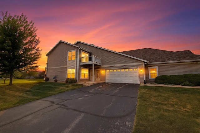 15538 Finley Way Unit 2, South Beloit, IL 61080 - traditional-style house with a balcony, an attached garage, a yard, and driveway