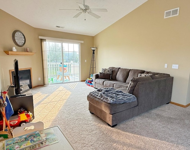 15538 Finley Way Unit 2, South Beloit, IL 61080 - carpeted living room with a ceiling fan and vaulted ceiling