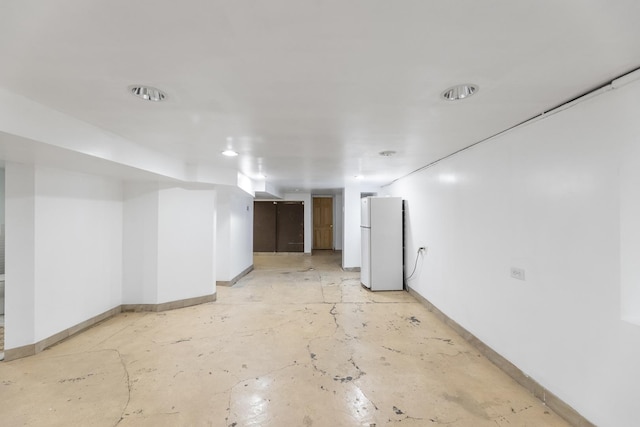 3928 W 63rd Pl, Chicago, IL 60629 - finished below grade area featuring freestanding refrigerator and baseboards
