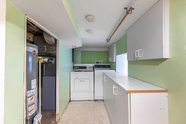 3928 W 63rd Pl, Chicago, IL 60629 - washroom featuring cabinet space, independent washer and dryer, and water heater
