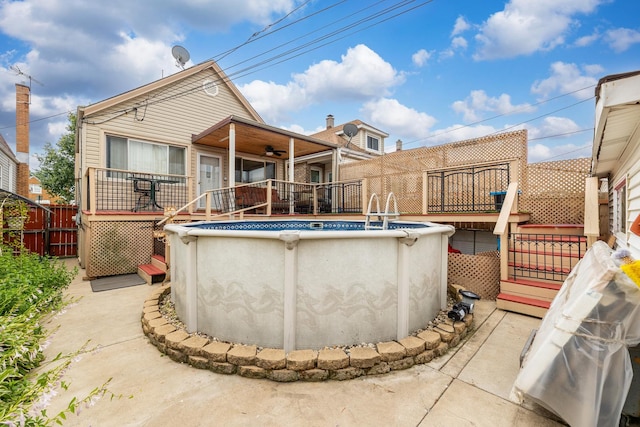 3928 W 63rd Pl, Chicago, IL 60629 - rear view of property with a wooden deck, ceiling fan, and stairs