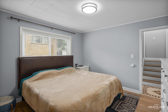 409 N Addison Rd, Villa Park, IL 60181 - bedroom with ornamental molding and wood finished floors