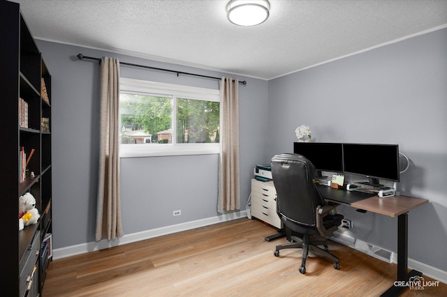 409 N Addison Rd, Villa Park, IL 60181 - office space featuring ornamental molding, a textured ceiling, and light wood-style floors