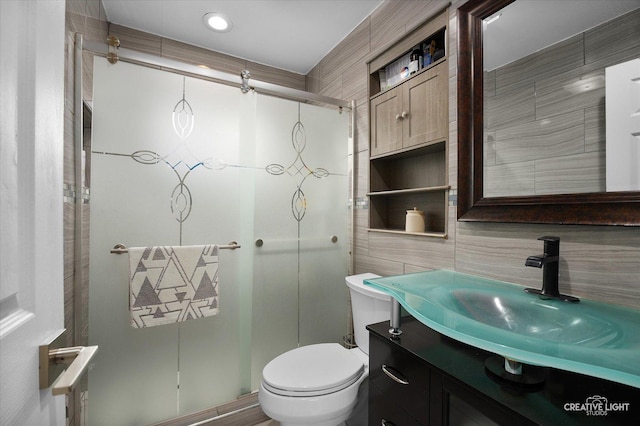409 N Addison Rd, Villa Park, IL 60181 - full bathroom with a stall shower, vanity, and tile walls