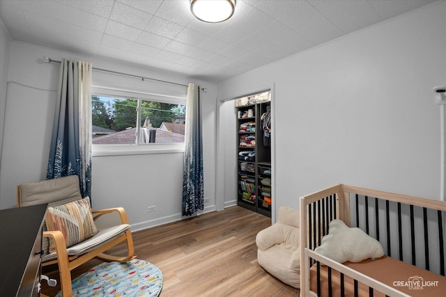409 N Addison Rd, Villa Park, IL 60181 - bedroom with light wood-style floors and a closet
