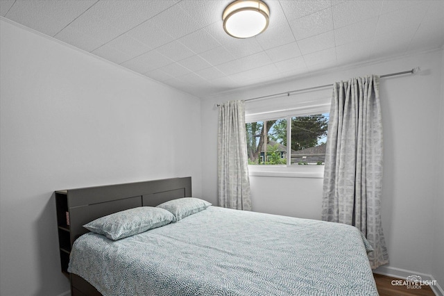 409 N Addison Rd, Villa Park, IL 60181 - bedroom with wood finished floors and baseboards