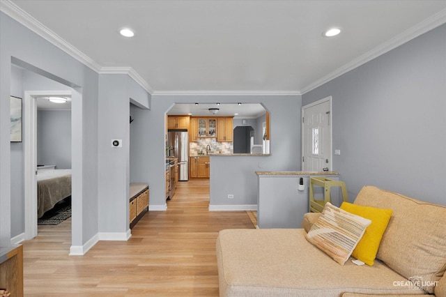409 N Addison Rd, Villa Park, IL 60181 - living area featuring light wood-style floors, arched walkways, ornamental molding, and recessed lighting