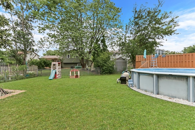 513 White Birch Rd, Lindenhurst, IL 60046 - fenced backyard with a playground