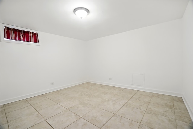5222 Wright Ter, Skokie, IL 60077 - spare room featuring baseboards and light tile patterned floors