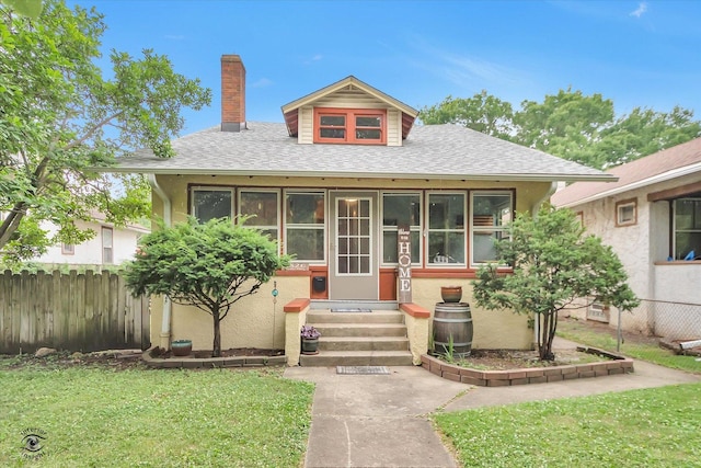 9826 S Walden Pkwy, Chicago, IL 60643 - bungalow-style house featuring entry steps, roof with shingles, a chimney, stucco siding, and a sunroom
