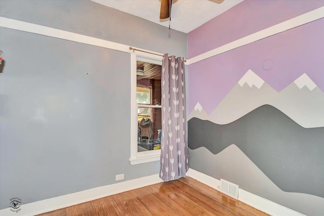9826 S Walden Pkwy, Chicago, IL 60643 - empty room with ceiling fan and wood finished floors