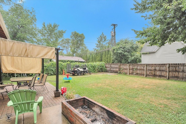 9826 S Walden Pkwy, Chicago, IL 60643 - fenced backyard featuring an outdoor fire pit and a patio