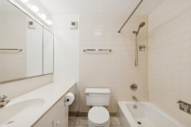 1230 N State Pkwy Unit 17A, Chicago, IL 60610 - bathroom featuring vanity, bathtub / shower combination, tile walls, and tile patterned flooring