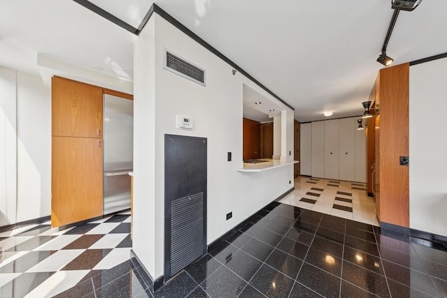 1230 N State Pkwy Unit 17A, Chicago, IL 60610 - corridor with granite tiled floors and rail lighting