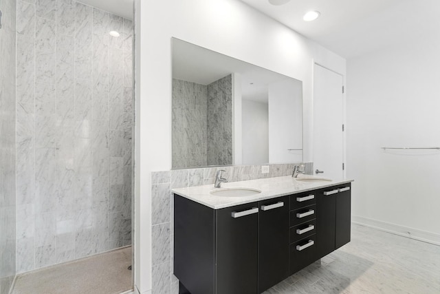 550 N Saint Clair St Unit 2301, Chicago, IL 60611 - bathroom with double vanity and a tile shower