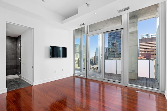 550 N Saint Clair St Unit 2301, Chicago, IL 60611 - spare room with healthy amount of natural light and wood finished floors