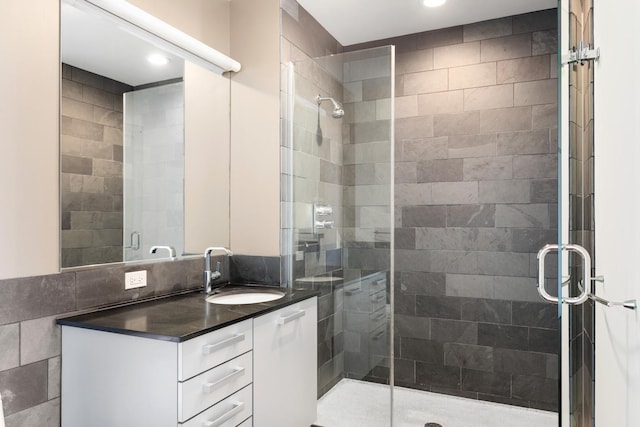 550 N Saint Clair St Unit 2301, Chicago, IL 60611 - bathroom featuring a stall shower, vanity, and recessed lighting