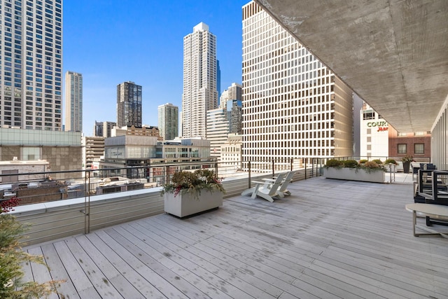 550 N Saint Clair St Unit 2301, Chicago, IL 60611 - wooden terrace featuring a view of skyline