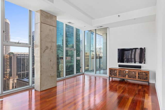 550 N Saint Clair St Unit 2301, Chicago, IL 60611 - unfurnished living room featuring expansive windows and wood finished floors