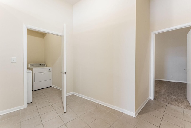 2120 W Grand Ave Unit D, Chicago, IL 60612 - laundry room featuring washer / clothes dryer and light tile patterned flooring