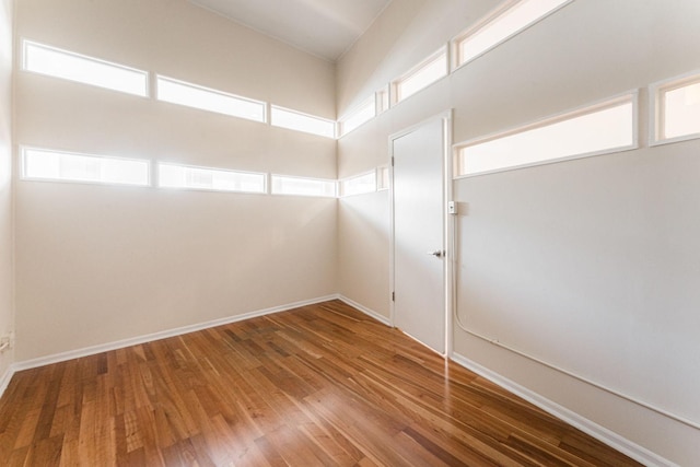 2120 W Grand Ave Unit D, Chicago, IL 60612 - unfurnished room featuring wood finished floors and baseboards