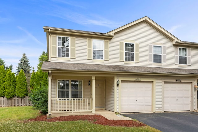 14208 S Napa Cir, Plainfield, IL 60544 - view of property featuring driveway, a porch, and a garage