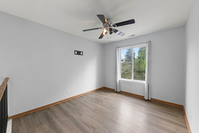 14208 S Napa Cir, Plainfield, IL 60544 - unfurnished room with wood finished floors and a ceiling fan