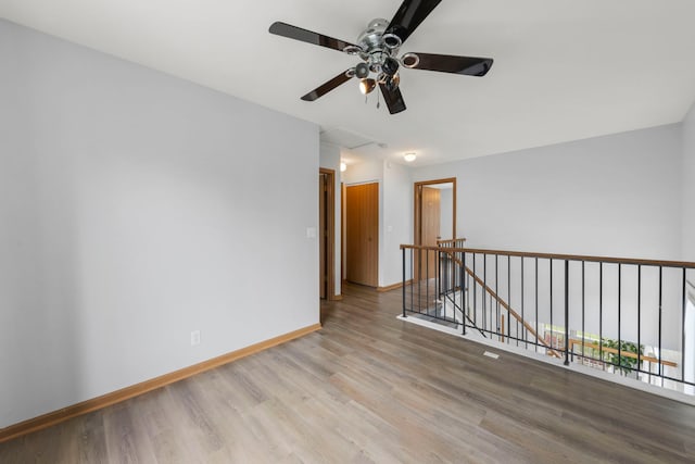 14208 S Napa Cir, Plainfield, IL 60544 - unfurnished room featuring wood finished floors and a ceiling fan