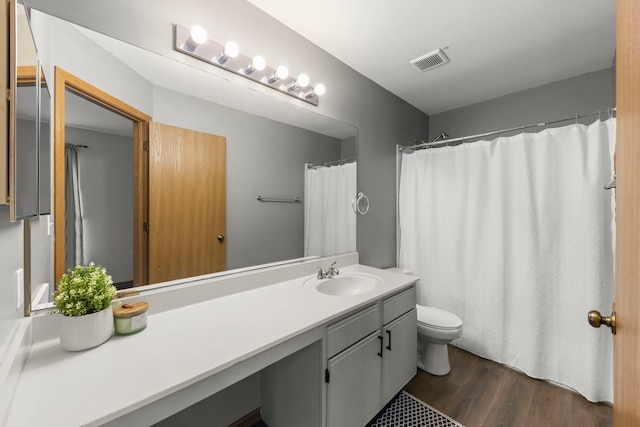 14208 S Napa Cir, Plainfield, IL 60544 - bathroom featuring vanity and wood finished floors