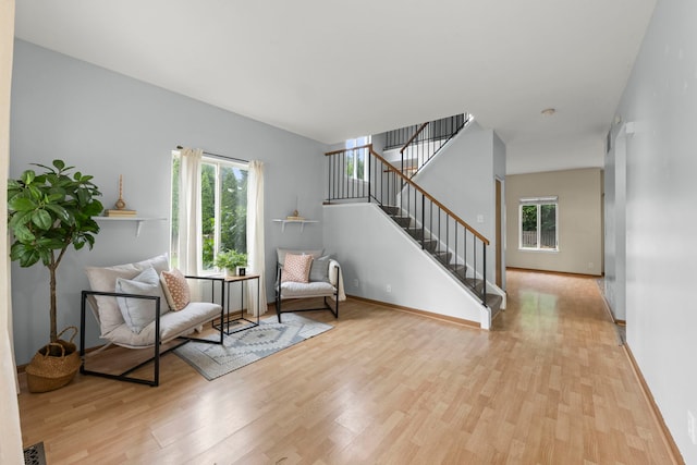 14208 S Napa Cir, Plainfield, IL 60544 - sitting room featuring wood finished floors and stairs