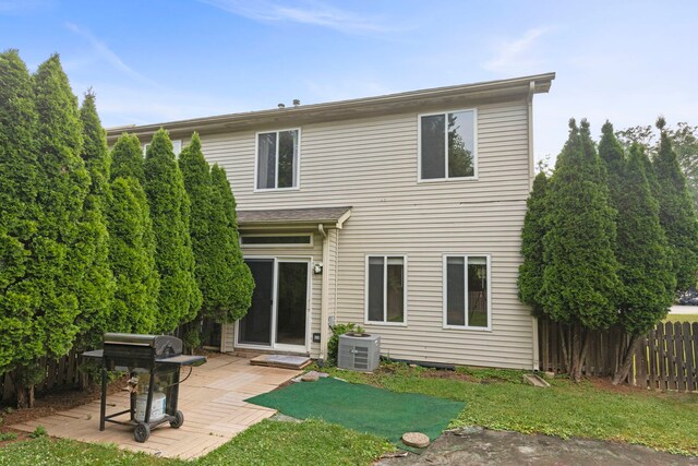 14208 S Napa Cir, Plainfield, IL 60544 - rear view of house featuring a patio