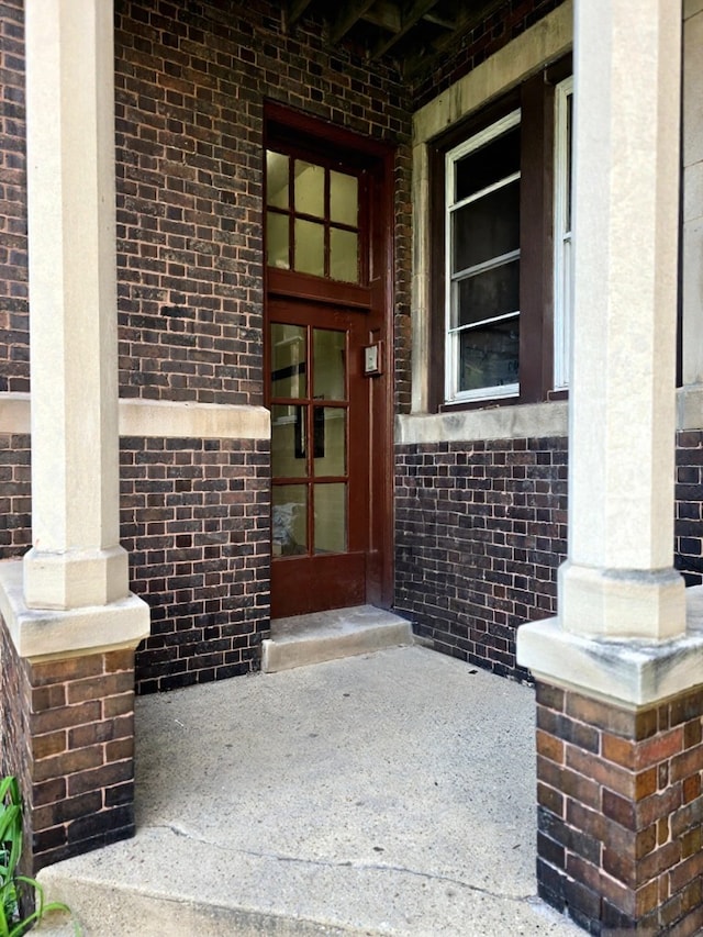 824 E Hyde Park Blvd Unit 1, Chicago, IL 60615 - entrance to property with brick siding and a porch