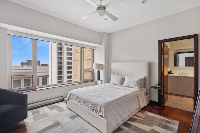 800 N Michigan Ave Unit 2502, Chicago, IL 60611 - bedroom featuring a baseboard heating unit, wood finished floors, a ceiling fan, connected bathroom, and recessed lighting