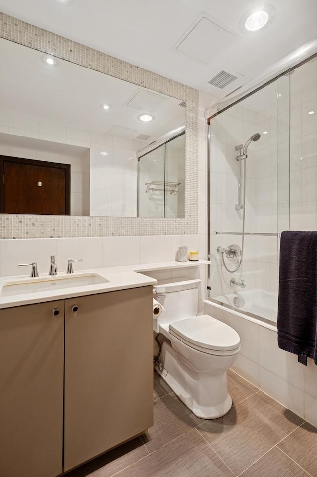 800 N Michigan Ave Unit 2502, Chicago, IL 60611 - full bathroom with tiled shower / bath, vanity, tile walls, and tile patterned floors
