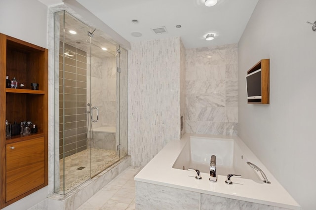 800 N Michigan Ave Unit 2502, Chicago, IL 60611 - bathroom with a stall shower, a garden tub, and marble finish floors