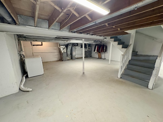 214 Tiverton Rd, Kankakee, IL 60901 - unfinished basement with washer / dryer, water heater, and stairway