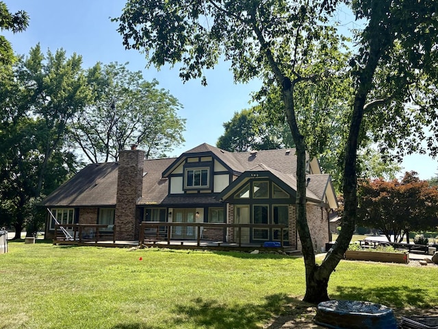 214 Tiverton Rd, Kankakee, IL 60901 - rear view of house with a lawn, a chimney, and a deck
