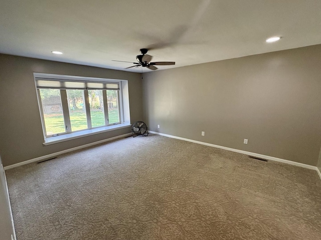214 Tiverton Rd, Kankakee, IL 60901 - empty room featuring a ceiling fan, carpet flooring, and recessed lighting
