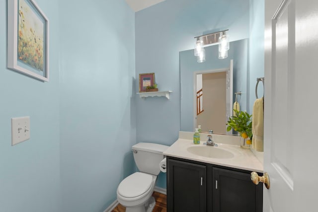 7425 Rosewind Dr, Plainfield, IL 60586 - half bathroom with vanity and wood finished floors
