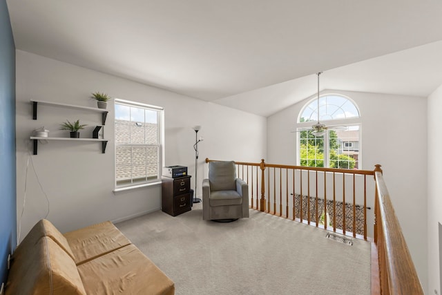 7425 Rosewind Dr, Plainfield, IL 60586 - sitting room with carpet, lofted ceiling, plenty of natural light, and an upstairs landing