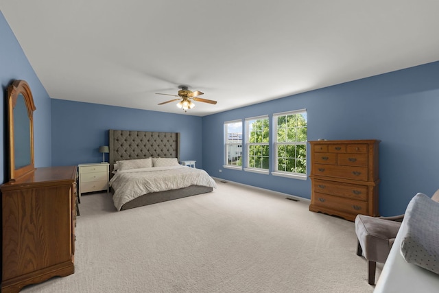 7425 Rosewind Dr, Plainfield, IL 60586 - carpeted bedroom with a ceiling fan and baseboards