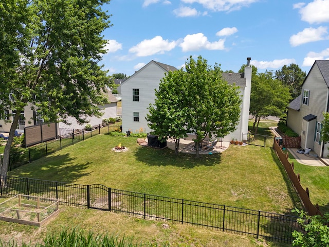 7425 Rosewind Dr, Plainfield, IL 60586 - fenced backyard with a patio and a vegetable garden