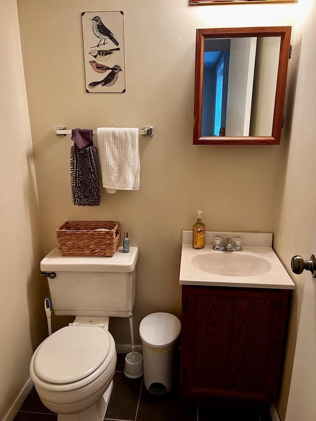 3111/2 W Graham St, Dixon, IL 61021 - half bathroom with vanity and tile patterned flooring