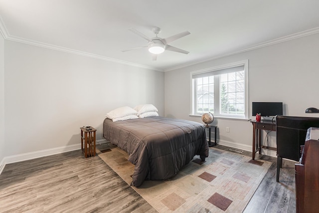 2182 Waterbury Ln E Unit 2182, Sycamore, IL 60178 - bedroom with light wood-type flooring, ornamental molding, ceiling fan, and a desk