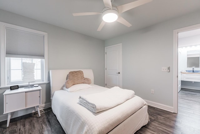 2182 Waterbury Ln E Unit 2182, Sycamore, IL 60178 - bedroom with dark wood-style flooring, ceiling fan, and connected bathroom