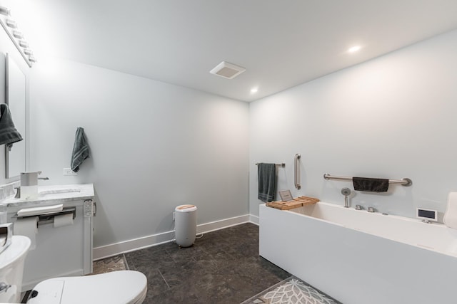 2182 Waterbury Ln E Unit 2182, Sycamore, IL 60178 - bathroom featuring a garden tub, vanity, and recessed lighting